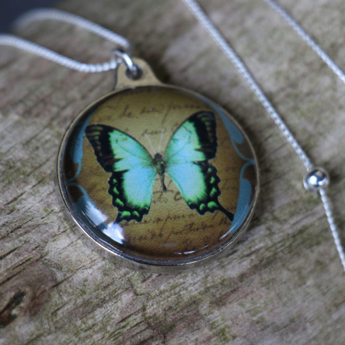 Ketting Turquoise butterfly Round